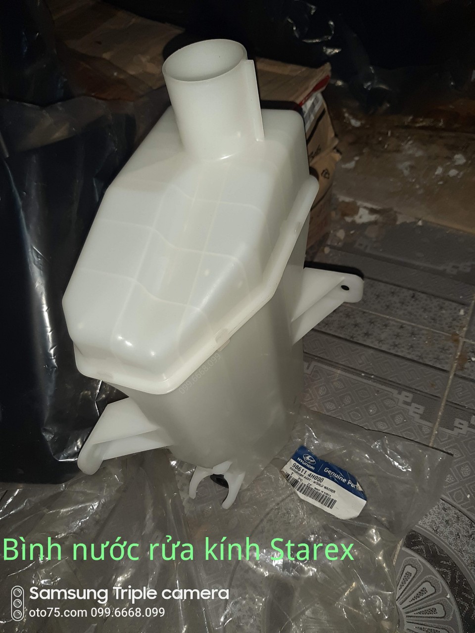 Bình nước rửa kính 986114H000 cho Starex